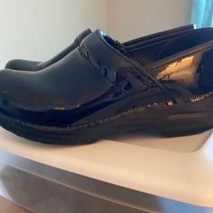 Dansko professional black patent clogs